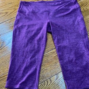 Athleta purple yoga capris.  Size Large Petite.  Small pocket in waistband.